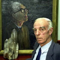 Н.А. Логачев на фоне портрета своего учителя Н.А. Флоренсова, 1999 г.